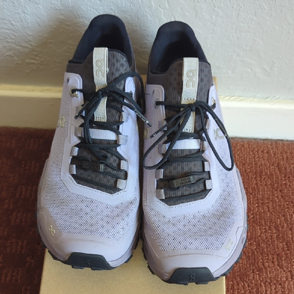 On Running Athletic Shoes Black and Lavender Streamlined Design